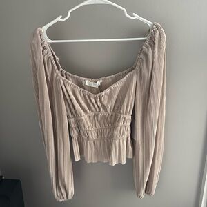 Pink blouse with detailed fabric